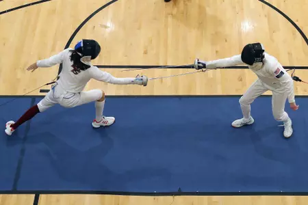 An overhead shot of a BC fencer (left) on the strip.