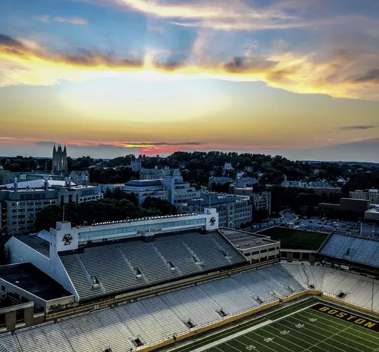 Alumni Stadium and campus at sunset.