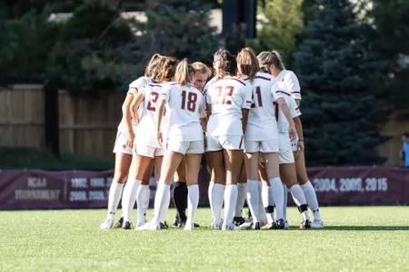 The team huddles before taking on BU.