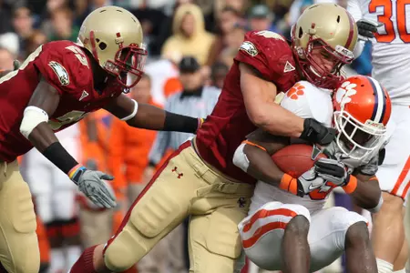 Luke Kuechly wraps up the Clemson ball carrier in a 2010 game at Alumni Stadium.