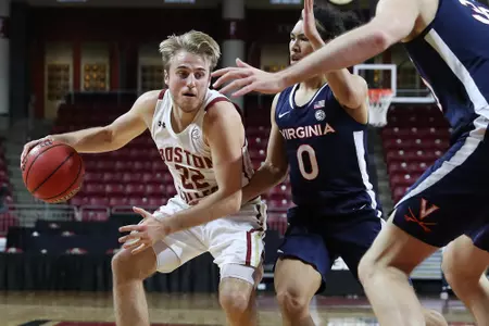 Rich Kelly drives the lane vs. Virginia