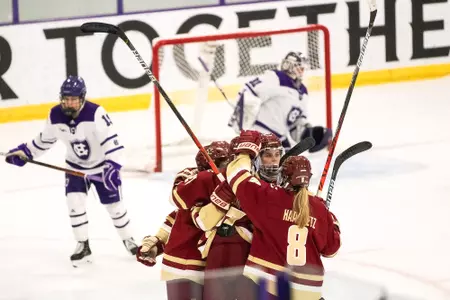 The Eagles celebrate a goal against Holy Cross.