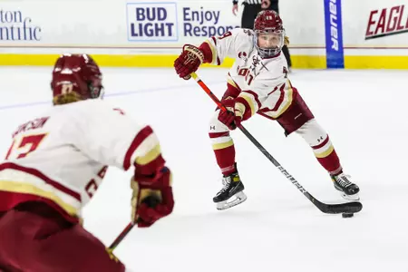 Hannah Bilka looks to pass the puck to Willow Corson.