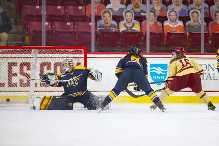 Alexie Guay scores a goal on the backhand against Merrimack.