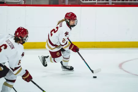 Olivia O'Brien carries the puck up the ice.