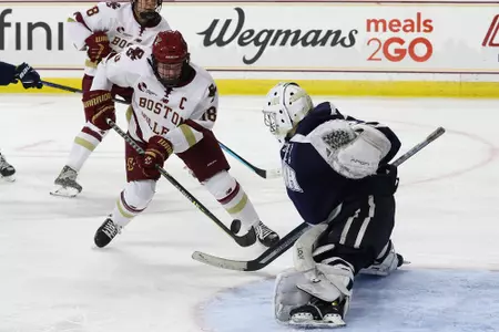 Kelly Browne backhands a pass on net.