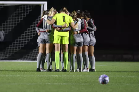 The Eagles huddle before facing Virginia.
