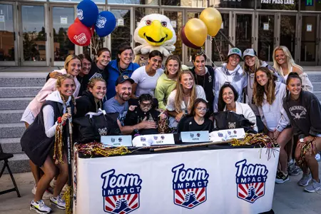 BC with its two newest signings through Team Impact