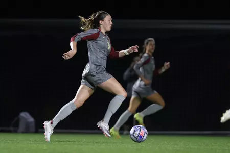Sam Smith takes the ball up the field against Virginia.