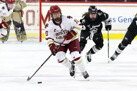 Caroline DiFiore carries the puck up the ice against Providence.