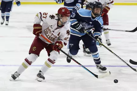 Willow Corson drives into the zone with the puck against Maine.
