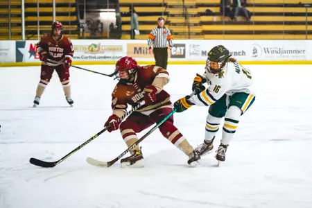 Caroline Goffredo turns with the puck against Vermont.