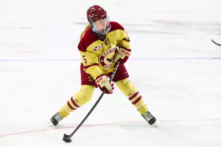 Savannah Norcross flexes her stick to take a wrist shot.