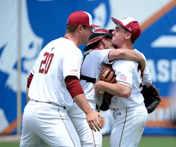 Boston College Ryan Smith (16) celebrates beating Louisville with his team during game four of the 2019 ACC Baseball Tournament in Durham, N.C., Wednesday, May 22, 2019. (Photo by Sara D. Davis, the ACC)