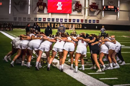 BC Lacrosse in a huddle