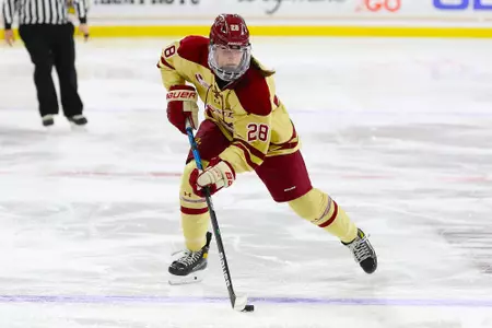 Gaby Roy skates the puck up the ice.