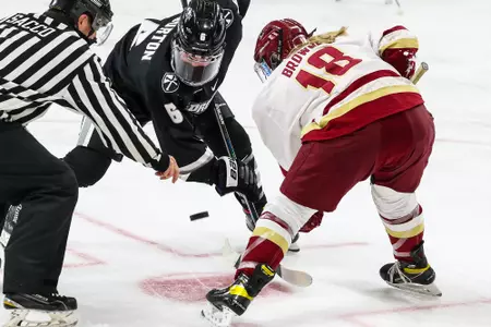 Kelly Browne takes a face off against Providence.