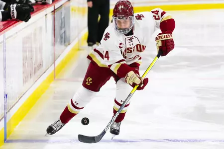 Caroline Goffredo carries the puck over the blue line.
