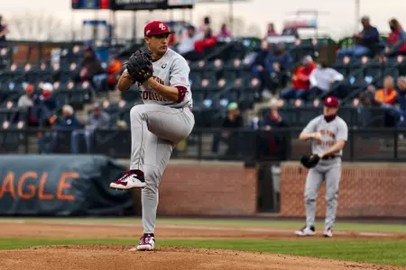 Mason Pelio gets in warm-up pitches at Auburn.