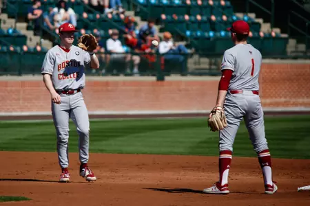 Brian Dempsey and Luke Gold on the infield at Auburn