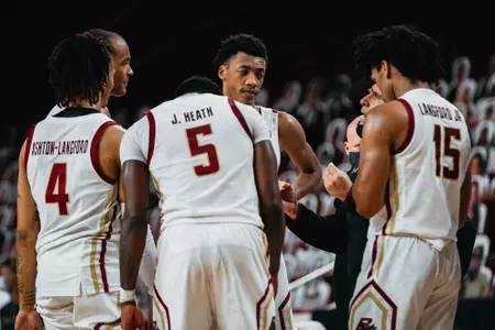 BC men's basketball huddle