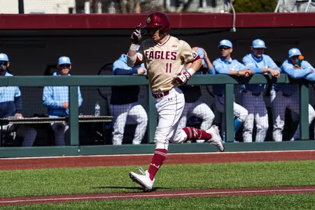 Sal Frelick reaches home after a home run vs. UNC