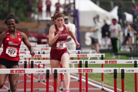 Jessica Creedon competing in the hurdles