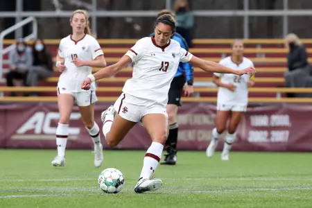 Linda Boama lines up the ball for a shot against Northeastern.