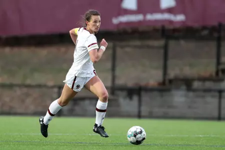 Jenna Bike turns up field with the ball.