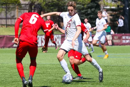 STefan Sigurdarson dribbles the ball up field against NC State.