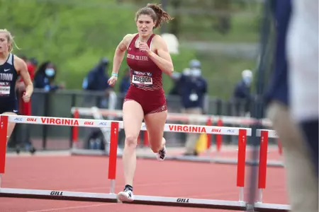 Jessica Creedon competing in the hurdles