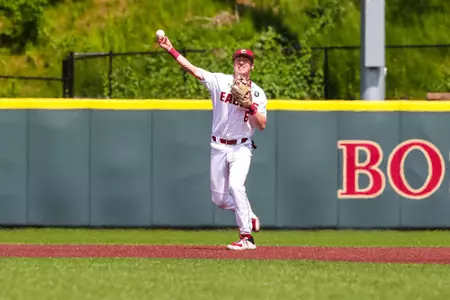 Brian Dempsey throws to first vs. Virginia