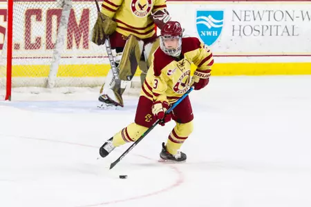 Deirdre Mullowney carries the puck up the ice.