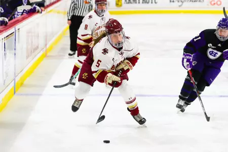 Savannah Norcross carries the puck into the offensive zone.