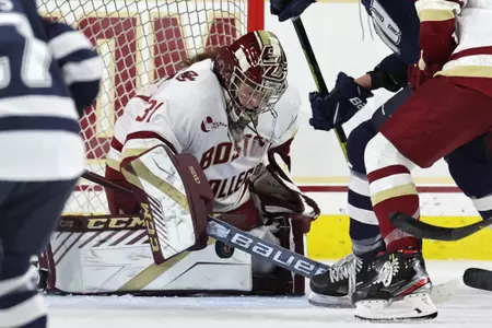Kelly Pickreign makes a save against UNH.