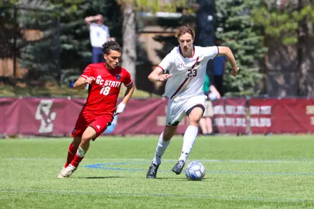 STefan Sigurdarson dribbles the ball up field against NC State.
