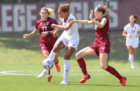 Linda Boama strikes a ball against UMass.