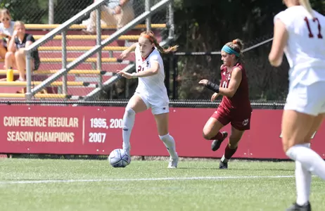 Andi Barth carries the ball up the field against UMass.