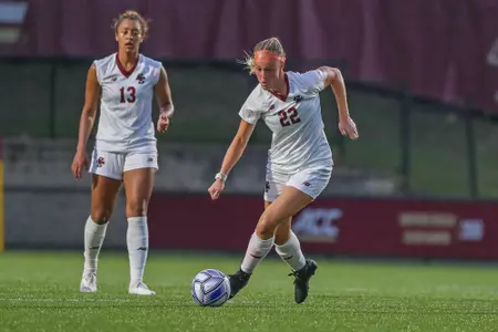 Ella Richards brings the ball up the field against UMass.