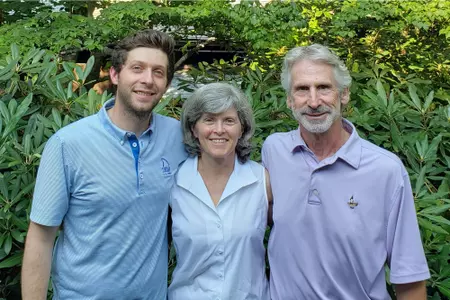 Cameron (l), Roxanne (m) and Don (r) Mayer pose for a family photo.
