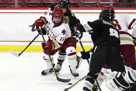 Alexie Guay fights for the puck against Providence.