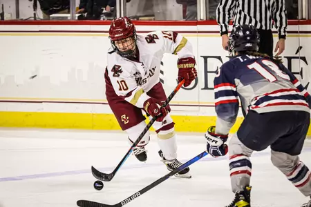 Caroline DiFiore carries the puck up the ice against UConn.