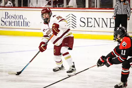 Sidney Fess looks to move the puck against Northeastern.