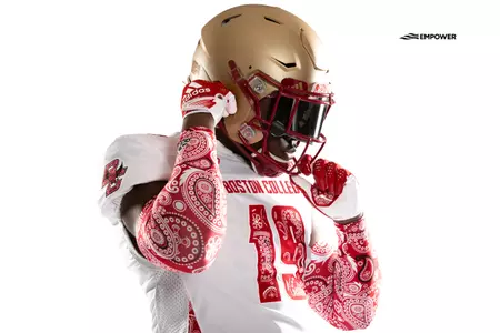 Red Bandanna Game Time Announcement Photo ft. Kam Arnold in No. 19 Red Bandanna jersey.