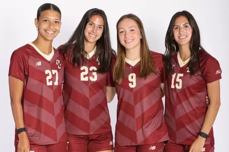 From left to right, Sydney Moore, Michela Agresti, Sam Smith and Samantha Agresti pose on media day.