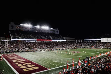 Wide shot of the field, stands and press box inside Alumni Stadium during the Clemson game