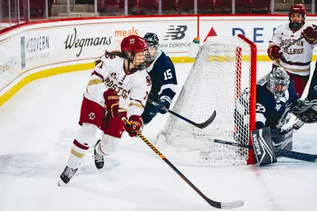 Katie Pyne skates the buck behind the net against Penn State.