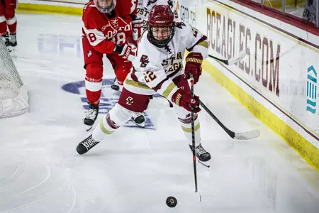 Olivia O'Brien carries the puck behind the net against BU.