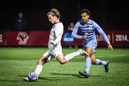Jonathan Murphy strikes the ball vs. UNC