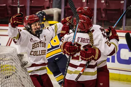 The Eagles celebrate a goal against Merrimack.